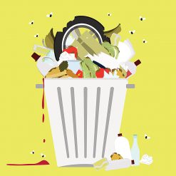 A bin overflowing with wasted food
