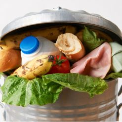 a bin overflowing with food waste